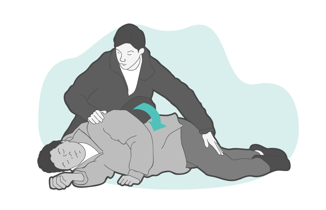 Roll the person onto their side